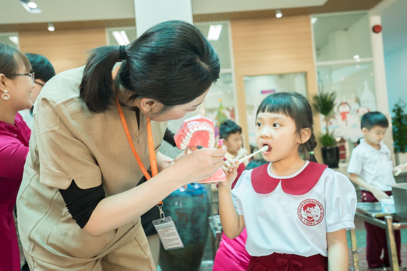 Practicing oral care skills with Japanese dentists