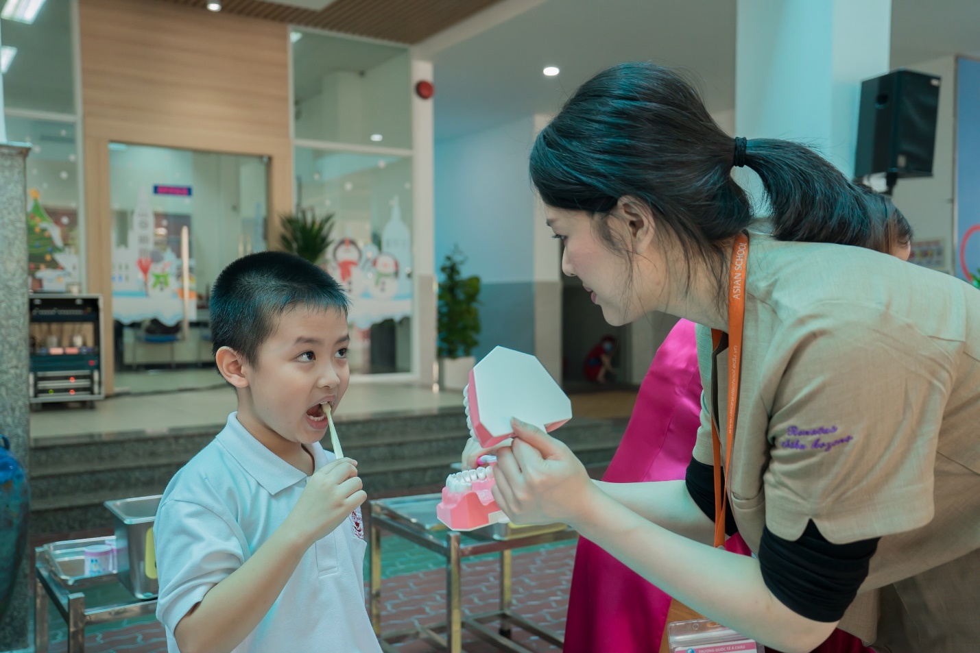 Practicing oral care skills with Japanese dentists
